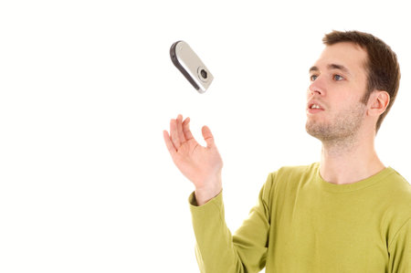 Young guy with cell phone (isolated on white)