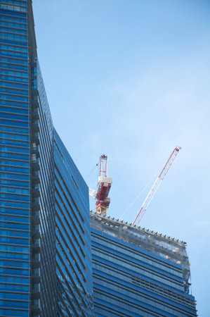 Skyscrapers  under construction with cranes