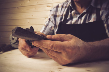 Senior carpenter working in workshop
