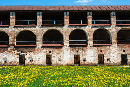 ancient wall of Kirillo-Belozersky Monastery with arcs and doorsの写真素材