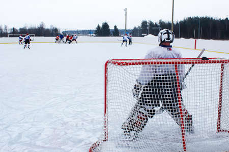 ice hockey goalkeeper waiting for attackの写真素材