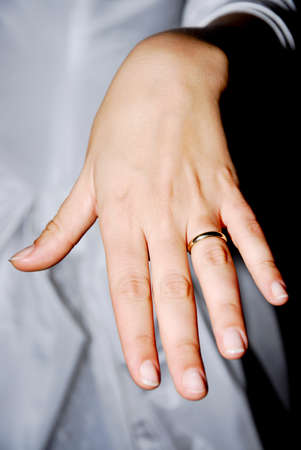 hand showing a wedding ringの写真素材