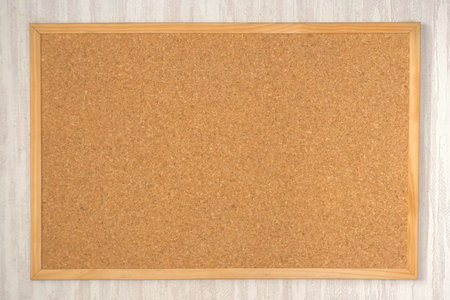 Empty cork board on the wall