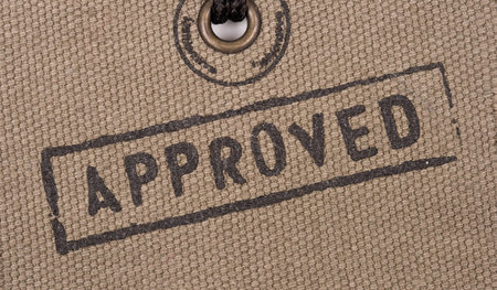  Approved woven on textile background