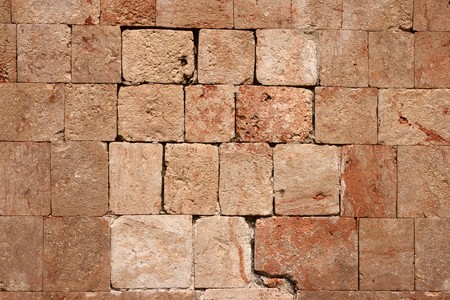 Texture of stone wall of ancient Mayan ruins in Mexicoの写真素材