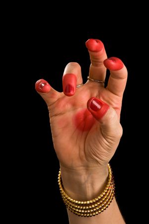 Woman hand showing Kangula hasta (hand gesture, also called mudra)  (meaning "Tail") of indian classic dance Bharata Natyam. Also used in other indian classical dances Kuchipudi and Odissi.の写真素材