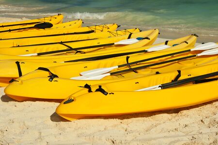 Kayaks on the beach sandの写真素材