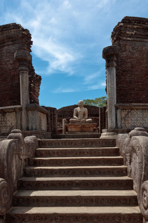 Ancient sitting Buddha image in votadage. Pollonaruwa, Sri Lankaの写真素材