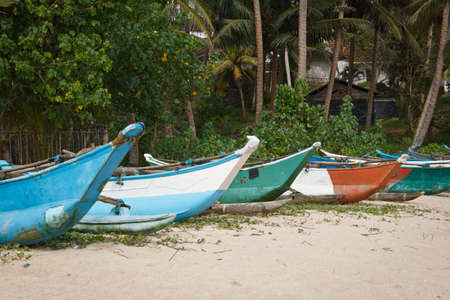 Fishing boats on beach. Mirissa, Sri Lankaの写真素材