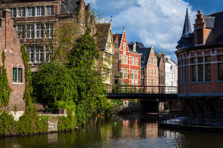 Travel Belgium medieval european city town background with canal. Ghent, Belgiumの写真素材