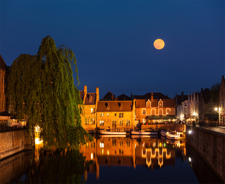Canal and medieval houses in twilight. Bruges (Brugge), Belgiumの写真素材