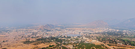 Panorama Holy city Pushkar and Puchkar Mela (camel fair) aerial view from Savitri temple. Rajasthan, Indiaの写真素材
