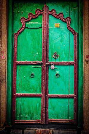 Retro hipster styled image of wooden old door vintage texture backgroundの写真素材