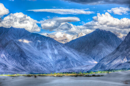 High dynamic range image valley in Himalayas. with sand dunes. Hunder, Nubra valley, Ladakh, Indiaの写真素材