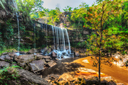 High dynamic range HDR image of tropical waterfall. Popokvil Waterfall, Bokor National Park, Cambodiaの写真素材