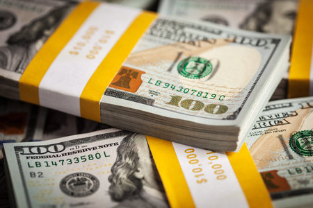 Creative business finance making money concept - background of new 100 US dollars 2013 edition...