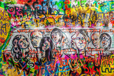 PRAGUE, CZECH REPUBLIC - APRIL 28, 2012: Lennon Wall  is filled with John Lennon-inspired graffiti and pieces of lyrics from Beatles songsのeditorial素材