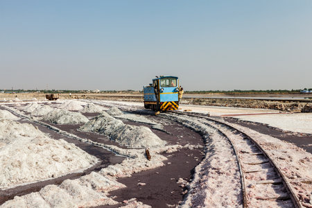 SAMBHAR, INDIA - NOVEMBER 19, 2012: Small train at salt mine at lake Sambhar, Rajasthan, India. Sambhar Salt Lake is India's largest inland salt lakeのeditorial素材