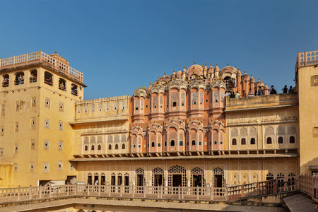 JAIPUR, INDIA - NOVEMBER 18, 2012: Tourists visiting Hawa Mahal palace (Palace of Winds) - famous Rajasthan landmarkのeditorial素材