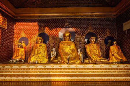 Buddha statues in Shwedagon pagodaの写真素材