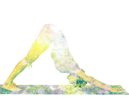 Double exposure image of woman doing yogaの写真素材