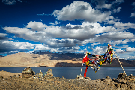 Buddhist prayer flags lungta at Himalayan lake Tso Moriri, Korzok, Ladakh, Indiaの写真素材