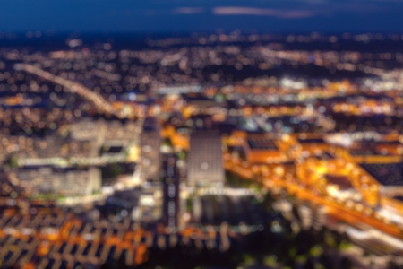 Blurred defocused city view at night backgroundの写真素材