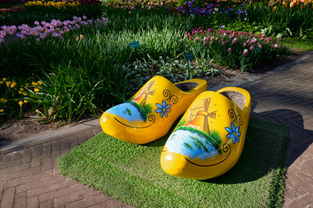 Wooden clogs klompen  in Keukenhof flower garden, Netherlandsのeditorial素材