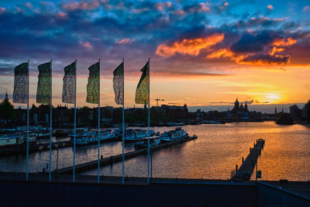 Amsterdam cityscape skyline with Church of Saint Nicholas on sunsetのeditorial素材