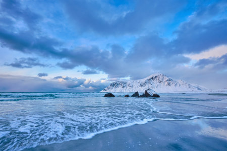 Norwegian Sea waves on rocky coast of Lofoten islands, Norwayの写真素材