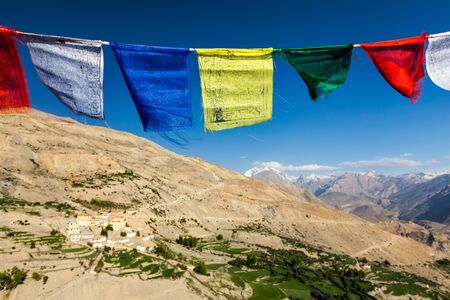 Buddhist prayer flags lungta in Spiti Valley, Indiaの写真素材