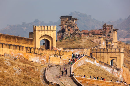 Visitors ascending to Amer (Amber) fort. Amer (near Jaipur), Rajasthan, India