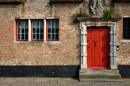 Door and window of an old house, Bruges (Brugge), Belgiumの写真素材