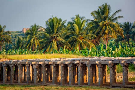 Ruins in Hampi on sunsetの写真素材
