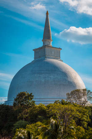 Mahaseya Dagoba Buddhist stupe in Mihintale, Sri Lanka, on sunsetの写真素材