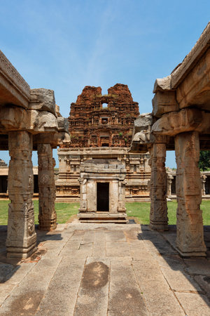 Mandapa pillared outdoor hall and gopura tower in Achyutaraya Temple in Hampiの写真素材