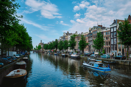 Singel canal in Amsterdam with houses. Amsterdam, Netherlands