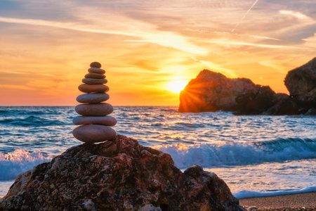 Concept of balance and harmony - stone stack on the beachの写真素材