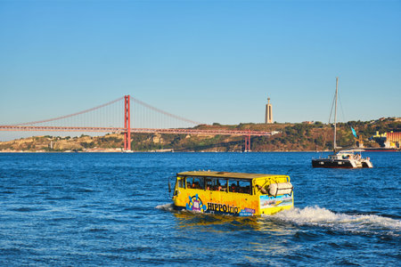 Lisbon, Portugal - August 31, 2022: HIPPOtrip amphibious sightseeing tourist bus in Tagus river with...