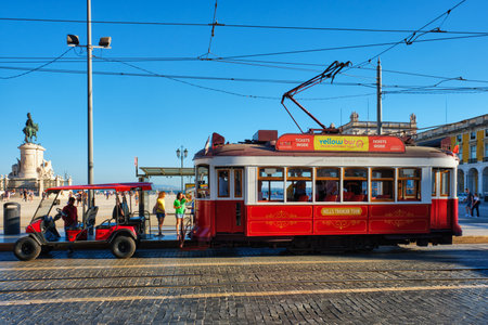 Lisbon, Portugal - August 31, 2022: Vintage tram for hills tramcar tourist tour on Commerce Square in street of Lisbon, Portugalのeditorial素材