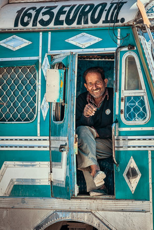 SARCHU, INDIA - SEPTEMBER 2, 2011: Driver in Indian lorry truck on on Manali-Leh road in Himalayas in Ladakh, Indiaのeditorial素材