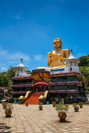 Dambulla, Sri Lanka - September 24, 2009: Golden Buddha temple with gold Buddha on roof, Dambulla, Sri Lanka. Golden Temple of Dambulla is a UNESCO World Heritage Siteのeditorial素材