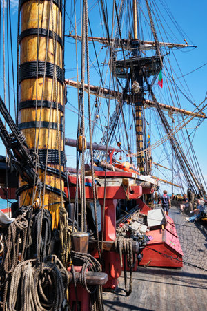 Lisbon, Portugal - September 6, 2022: Deck with masts and ropes of Gotheborg of Sweden - sailing replica of Swedish East Indiaman ship. It is one of world largest operational wooden sailing shipsのeditorial素材