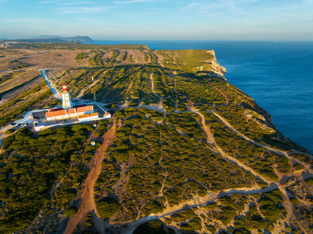 Aerial drone view of lighthouse on Cabo Espichel cape Espichel on Atlantic oceanの写真素材