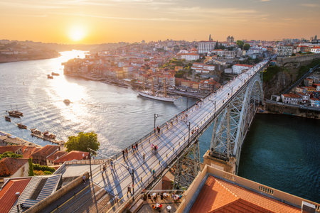 View of Porto city and Douro river and Dom Luis bridge I from famous tourist viewpoint Miradouro da Serra do Pilar on sunset. Porto, Vila Nova de Gaia, Portugalの写真素材