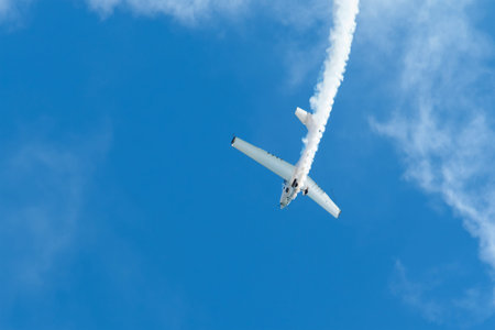 Stunt aerobatic plane performing stunts in air