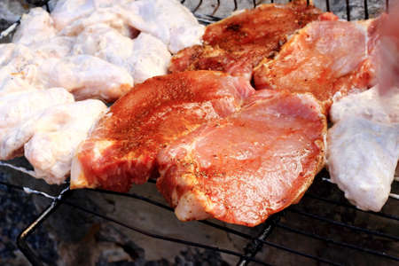 Red juicy steak fried on a grillの写真素材