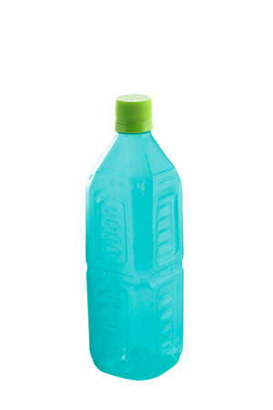 Plastic bottle empty turquoise with green cover isolated on whiteの写真素材