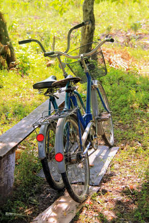 Two bike stand near the benches clear dayの写真素材