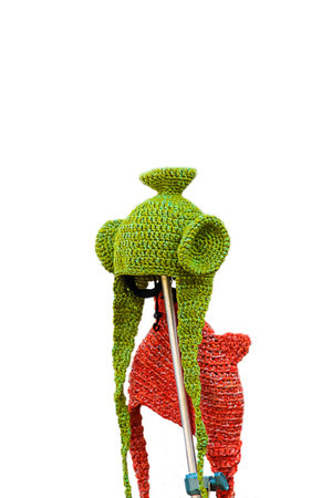 New Green Knit Wool Hat with Pom Pom isolated on white backgroundの写真素材